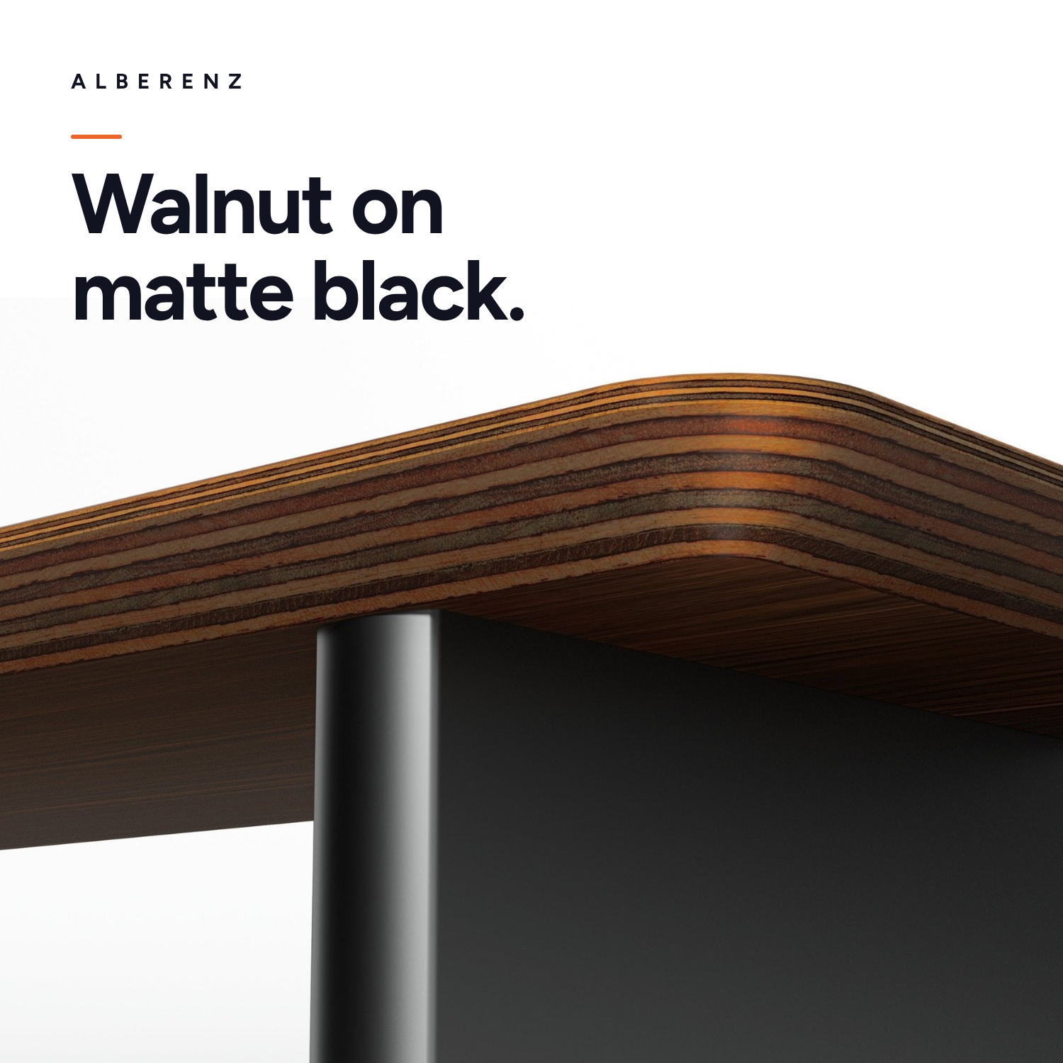 Alberenz gas spring monitor arm dark grey with walnut monitor riser: walnut top on matte black legs, close-up